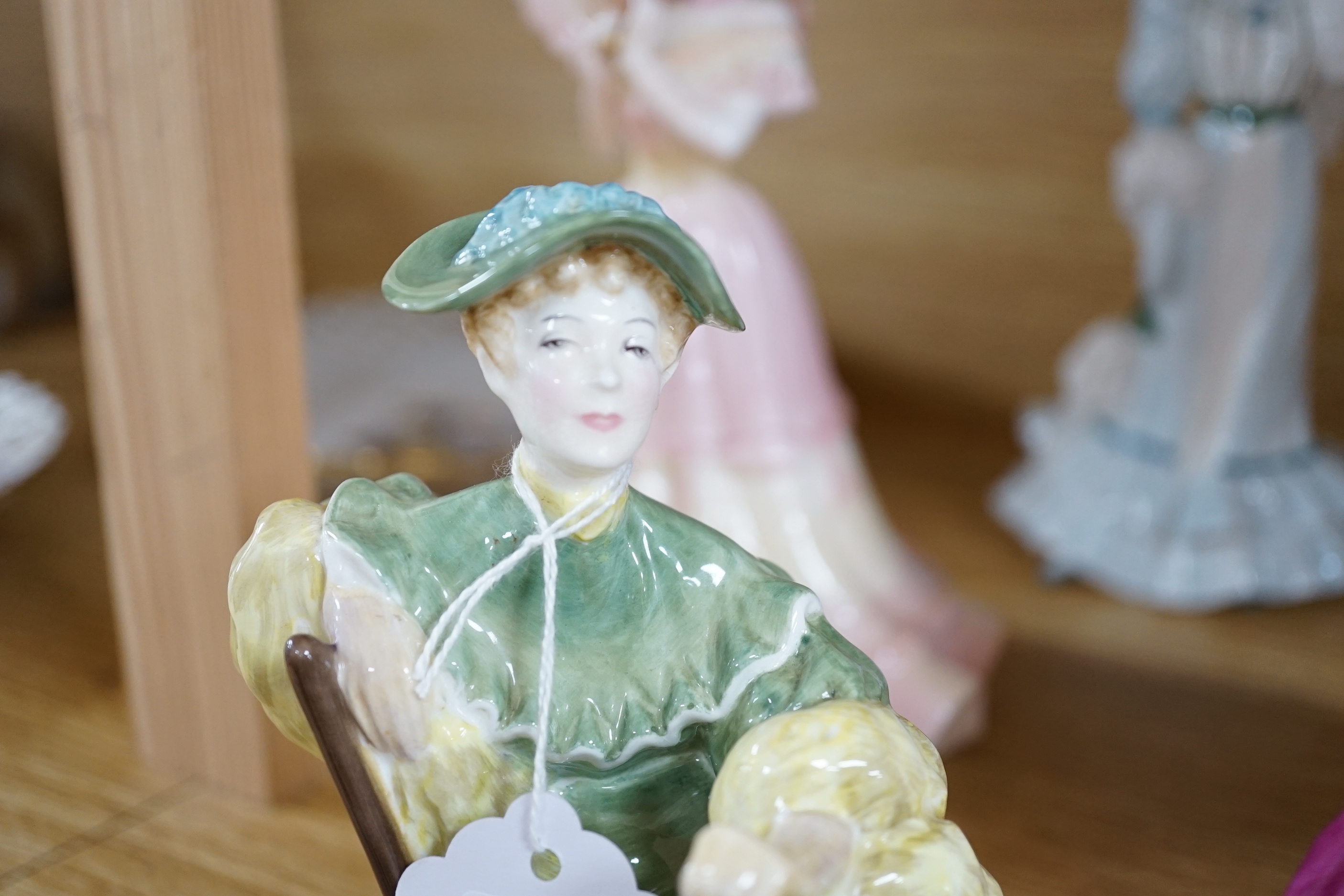 Seven Royal Doulton figurines and three Coalport figurines